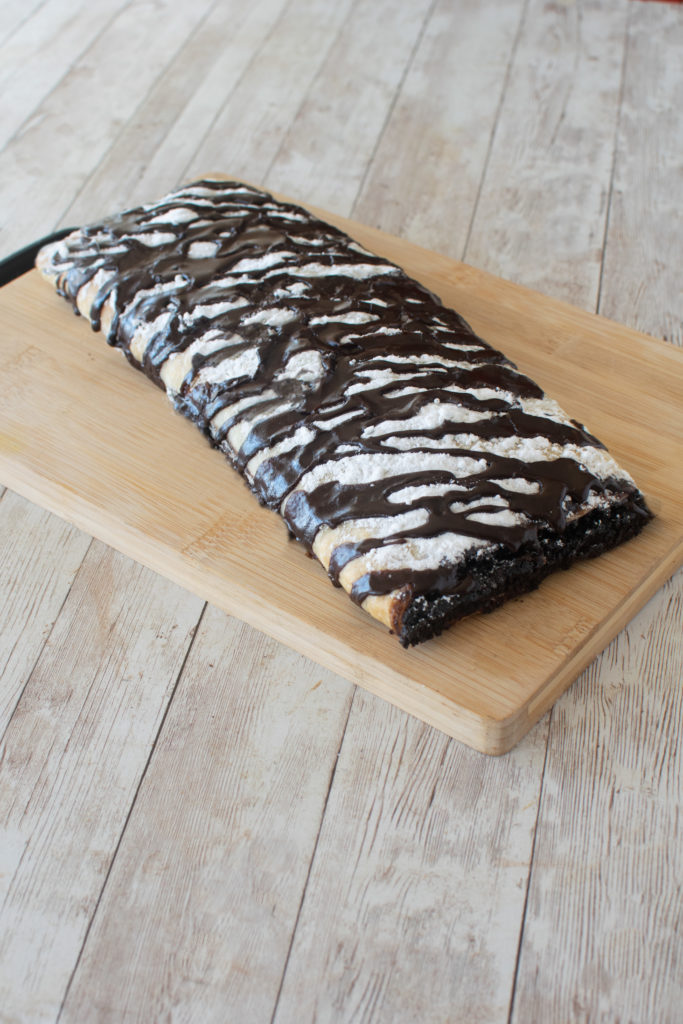 Brownie Pastry on a cutting board on a white table