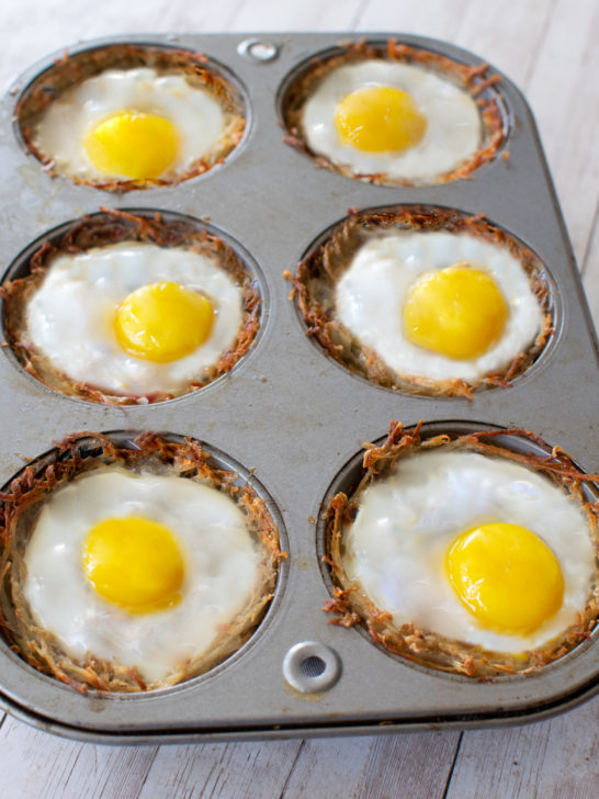 Cooked hash brown cups with eggs